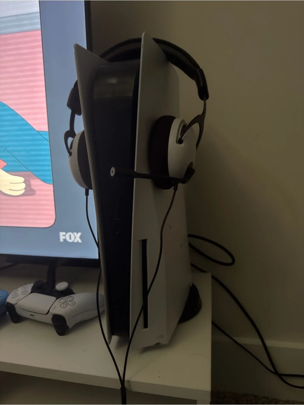 PlayStation 5 Console with White Over-Ear Headset